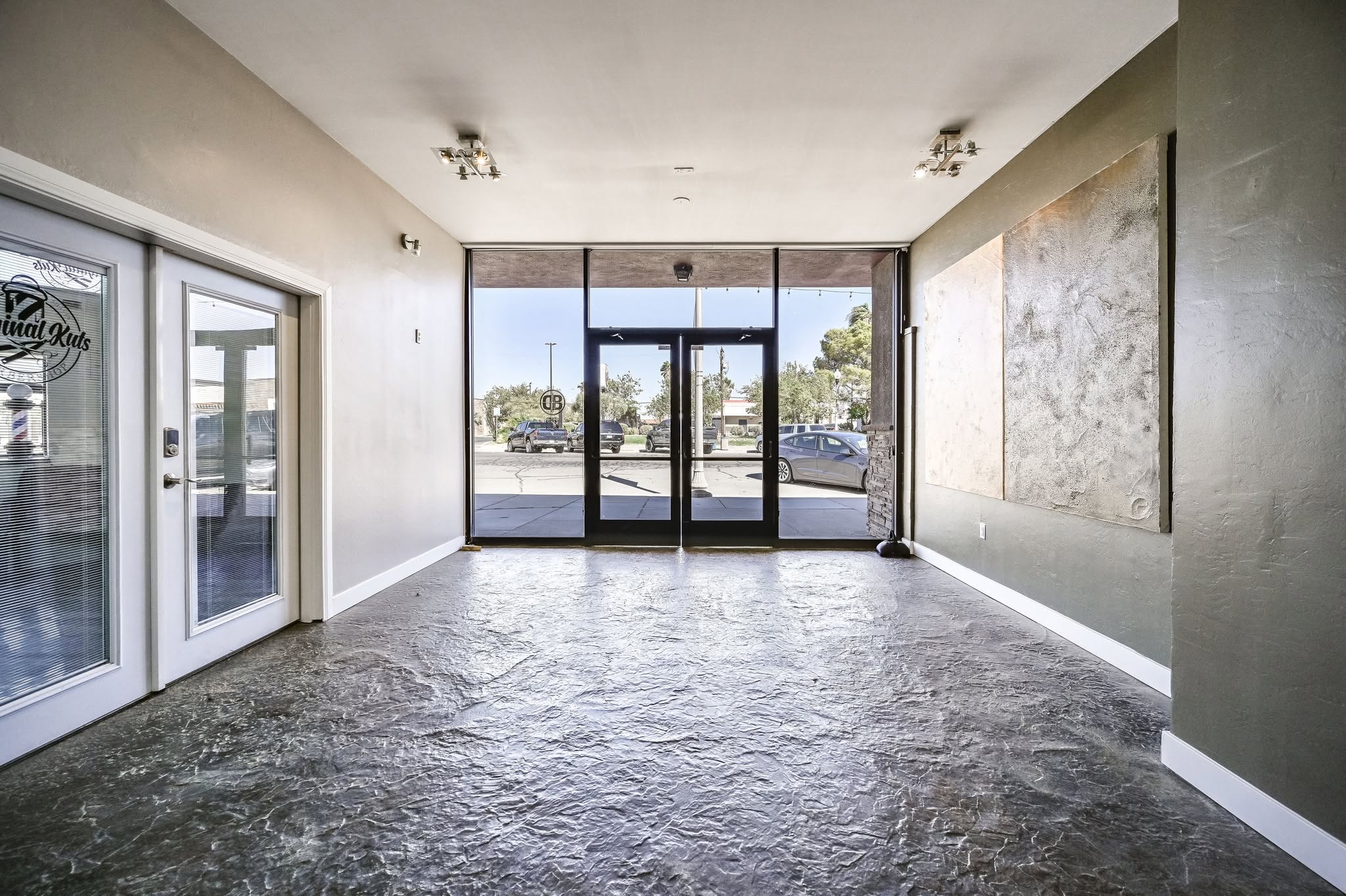 139 N Balsam St — street entrance with full-height glass storefront